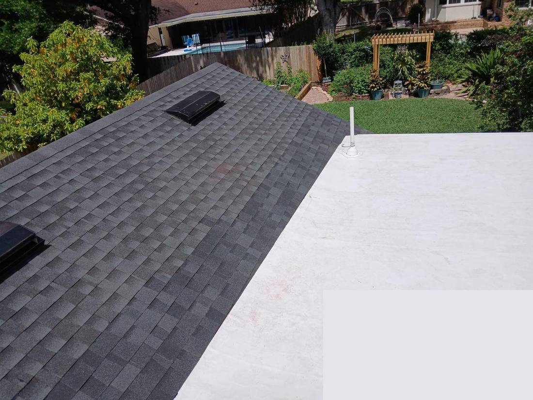 Combination flat and shingle roof replacement