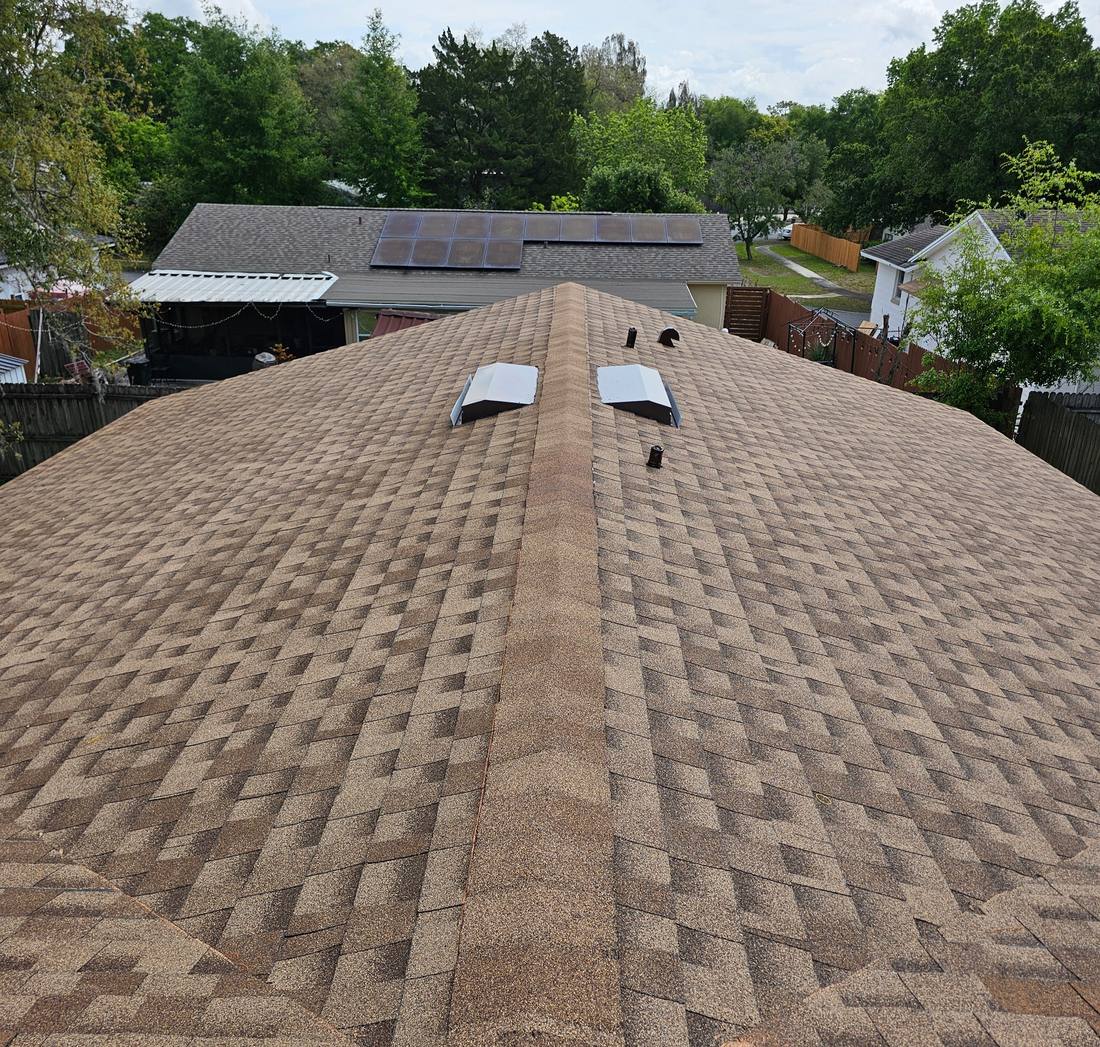 Shingle roof ridge line, completed reroof, Central Florida